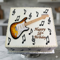 Guitar Shape Birthday Cake for Music Lovers Celebration