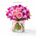 Luxury vase arrangement of pink roses and purple orchids with ribbon – bloomboxs.in
