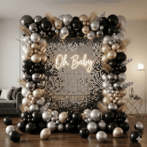 Luxe gold, black and silver baby shower balloon decoration with sequin backdrop and Oh Baby sign in Delhi NCR