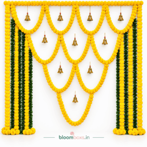 Traditional yellow marigold floral backdrop for Annaprashan decoration in Delhi NCR by Bloomboxs.in
