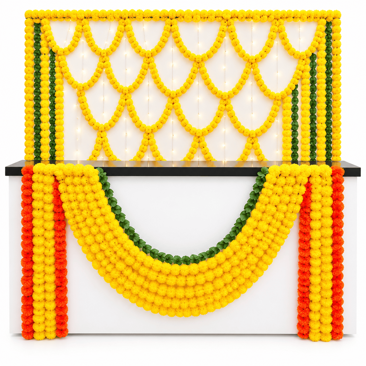 Reception counter decorated with fresh yellow marigold flower garlands, orange floral strings and green leaves in Delhi NCR